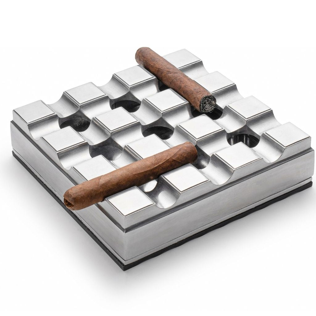 https://www.cigaroasis.com/cdn/shop/products/Cigar-Essentials-Executive-Steel-Grid-Cigar-Ashtray-with-Strong-Rubber-Base-CG-1000-Ashtrays-by-Cigar-Oasis_2000x.jpg?v=1658429313