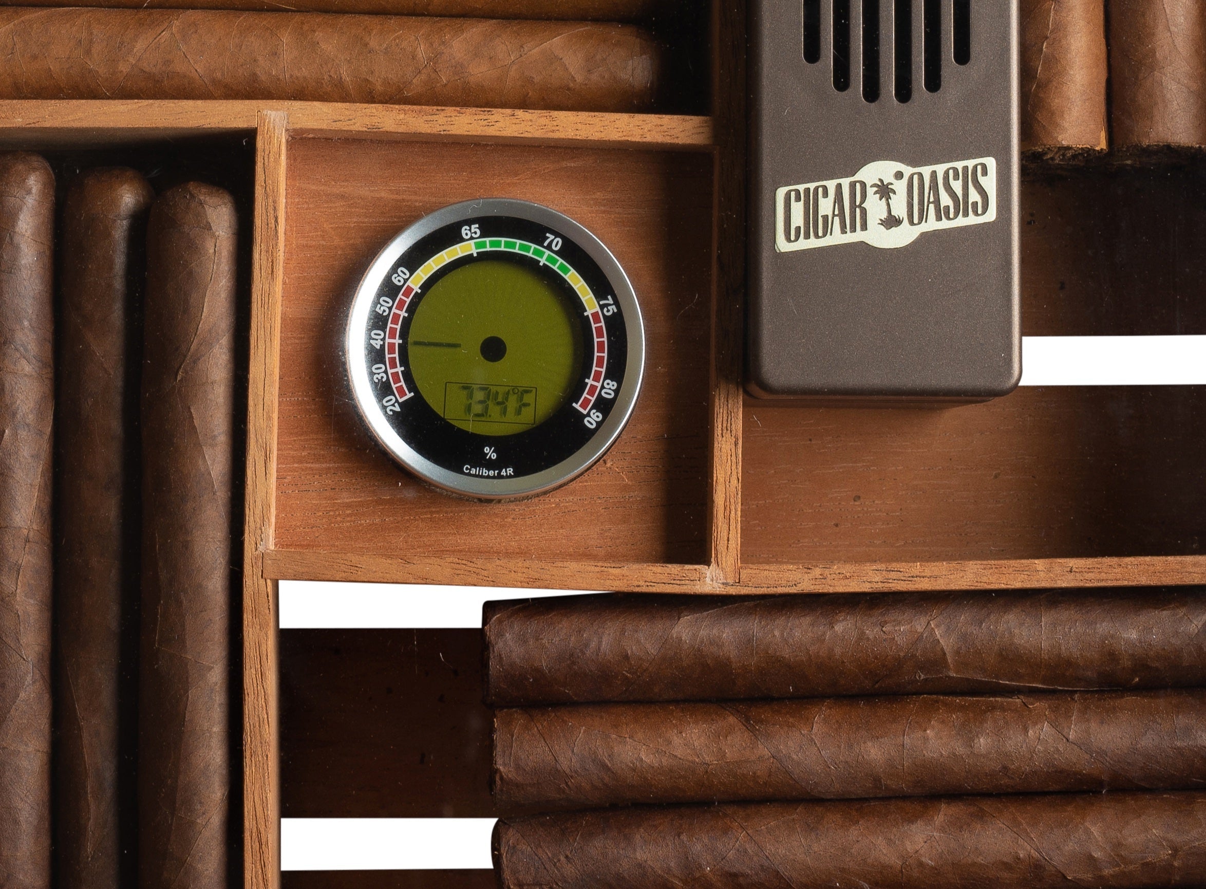 https://www.cigaroasis.com/cdn/shop/products/Cigar-Oasis-Cigar-Oasis-Caliber-4R-DigitalAnalog-Hygrometer-Hygrometers-by-Cigar-Oasis-6_5000x.jpg?v=1663181326